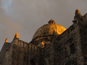 Low angle view of old building against sky