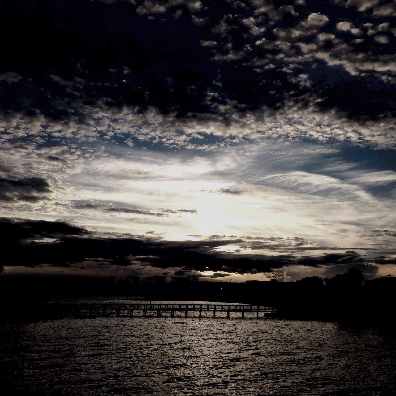 water, waterfront, tranquil scene, sky, tranquility, scenics, beauty in nature, cloud - sky, nature, sunset, river, sea, rippled, reflection, silhouette, lake, idyllic, cloud, cloudy, outdoors