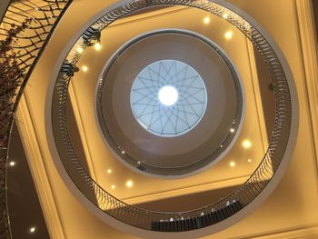 Low angle view of illuminated ceiling