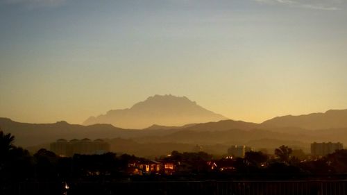 Scenic view of mountains at sunset