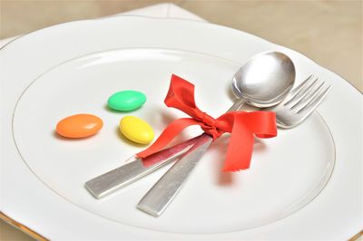 High angle view of eggs in plate on table