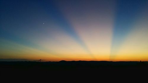 Silhouette of landscape at sunset