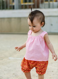 Asian kid girl wearing a thai dress,girl in thai costume.