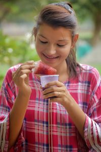 Woman having flavored ice