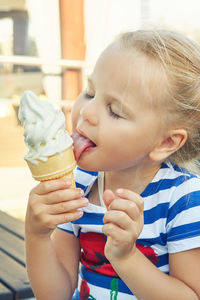 Cute girl holding ice cream