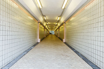 Empty corridor along walls