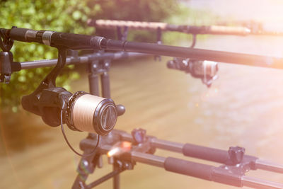 Close-up of fishing rod in lake