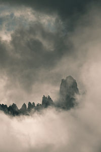 Rocky mountain peak and stormy clouds. tre cime di lavadero italy