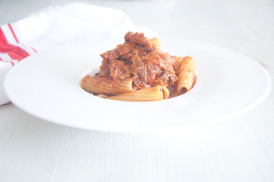 High angle view of meat in plate on table