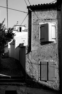 Alley amidst buildings in city