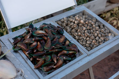 High angle view of carrots in crate at market