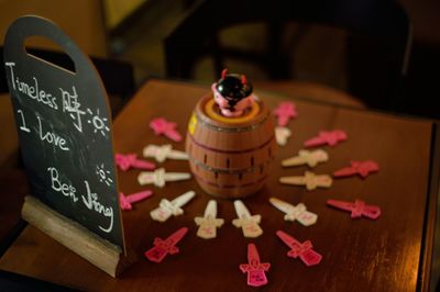 High angle view of blackboard and decoration on table