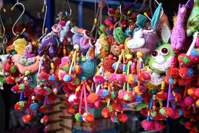 Close-up of colorful toys for sale in market