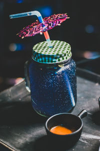 Close-up of drink in jar on table