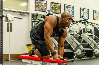 Full length of woman standing by railing