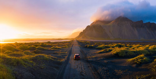 Panoramic view of road against sky during sunset