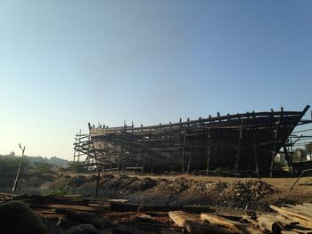 Abandoned construction site against clear sky