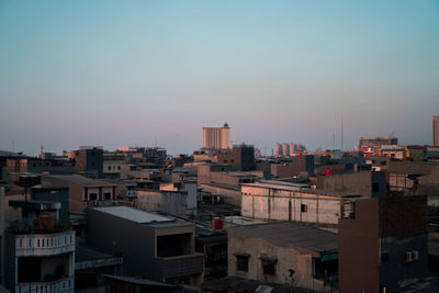 High angle view of buildings against sky during sunset