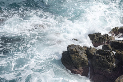 View of rocks in sea