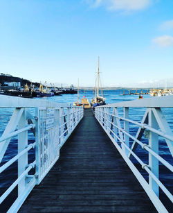 View of pier against blue sky