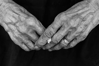 Close-up of wrinkled hands