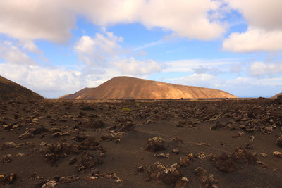 Scenic view of desert against sky