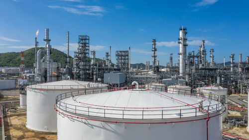 Oil and gas refinery petrochemical plant industrial with oil and gas storage tank, white oil and gas