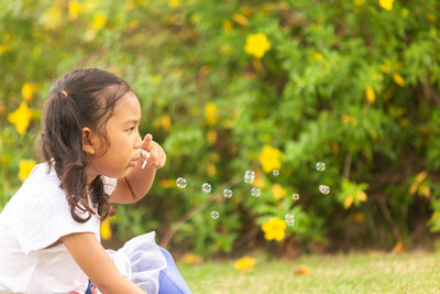 Side view of a girl smiling