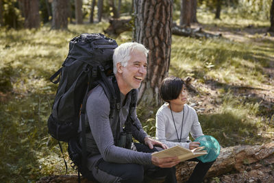 Father with son in forest