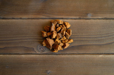 High angle view of bread on wooden table