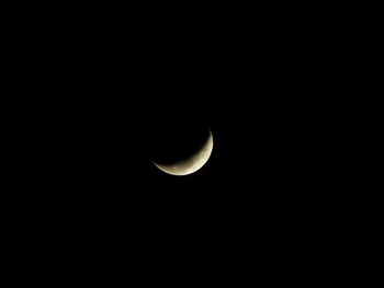 Scenic view of moon against sky at night