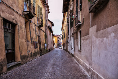 Alley amidst buildings in city