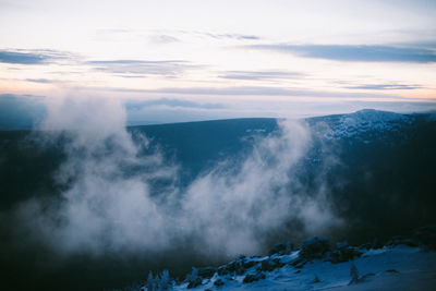 Scenic view of sea against sky during winter