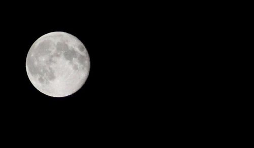 Low angle view of moon in sky