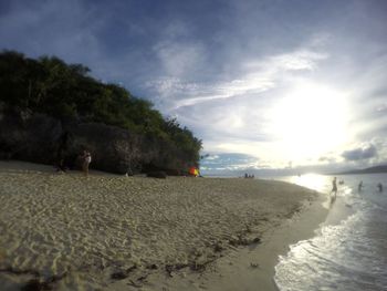 Scenic view of beach against sky