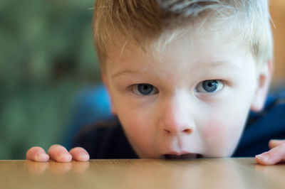 Close-up portrait of boy playing