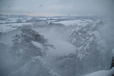 Aerial view of snow covered landscape