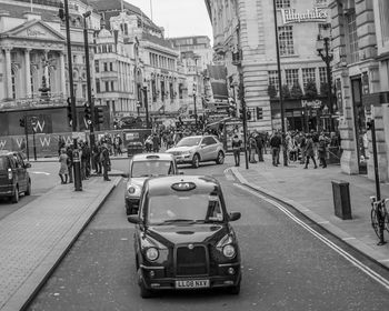 Cars on street in city