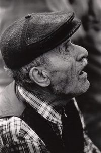 Close-up of senior man in hat