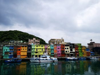 Tranquil rainbow buildings standing in a fishing village