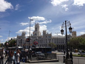 View of city against cloudy sky