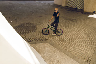 High angle view of man riding bicycle
