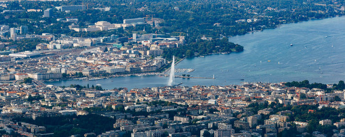 High angle view of townscape by sea