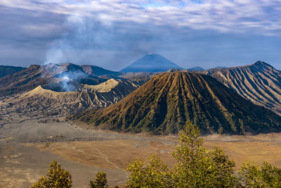 Panoramic view of volcanic mountain range against sky