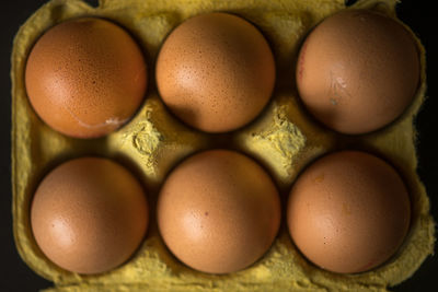 Close-up of eggs in carton