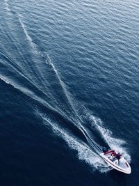 High angle view of boat sailing in sea