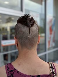 Rear view of woman with mohawk