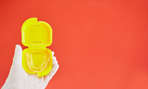 Close-up of toy against red background