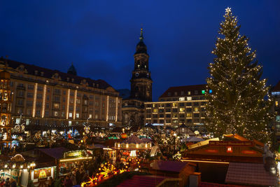 Illuminated buildings in city at night