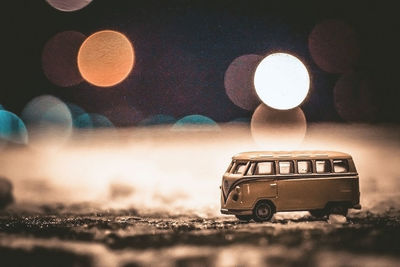 Toy car on road at night